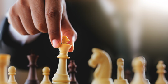 Businessman suit with chess board game. Plan strategy and tactic concept