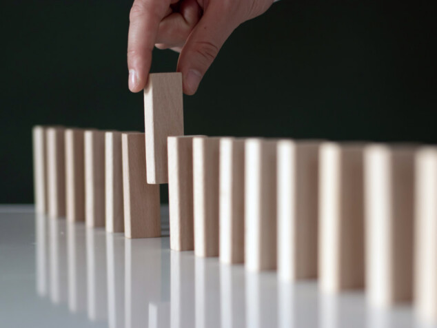 Removing a domino from a line of dominoes