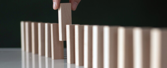 Removing a domino from a line of dominoes